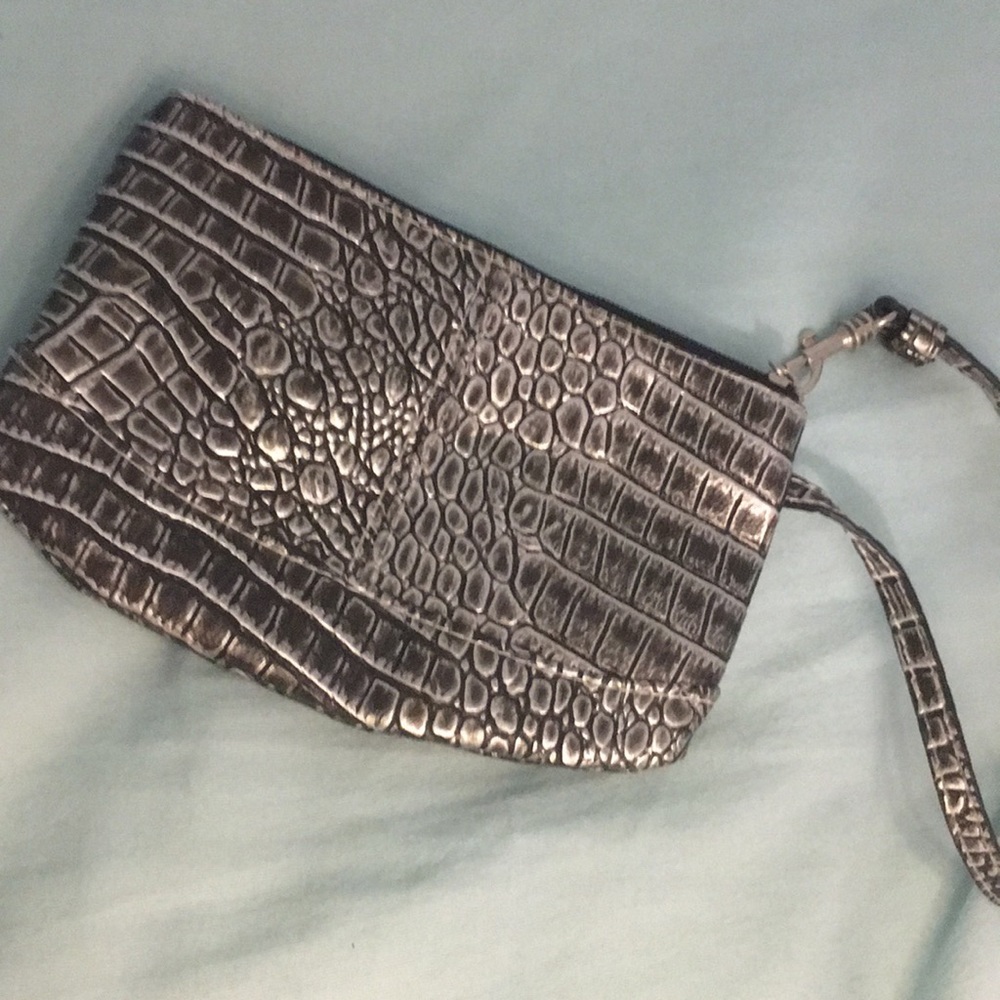 A faux snake skin hand bag